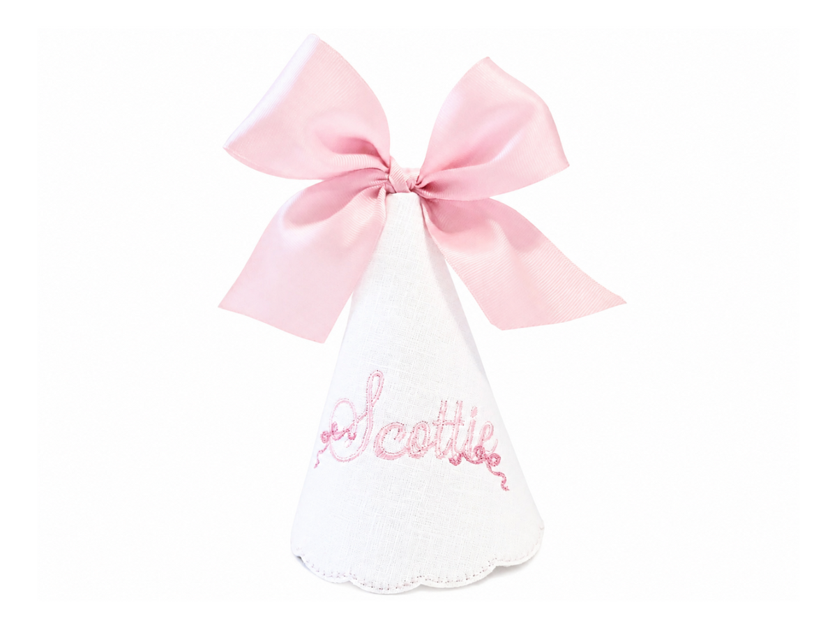 Bella Bow personalized linen first birthday party hat with pink embroidered bows and bow topper