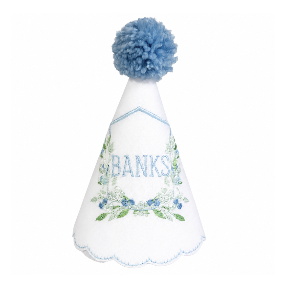 Berry Crest monogram linen first birthday party hat with blue crest embroidery and blue pom pom