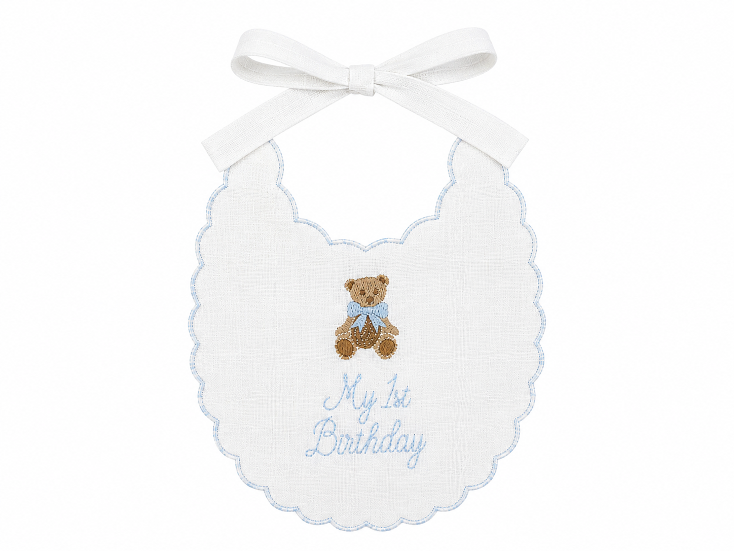 Blue Teddy Bear linen first birthday bib with embroidered teddy bear and blue details