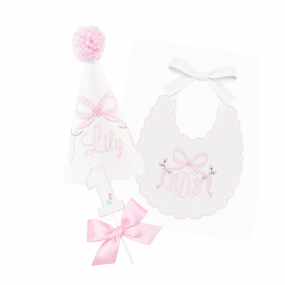 Bows and Blooms 3-piece first birthday cake smash set with embroidered party hat, birthday bib, and rosebud bow cake topper