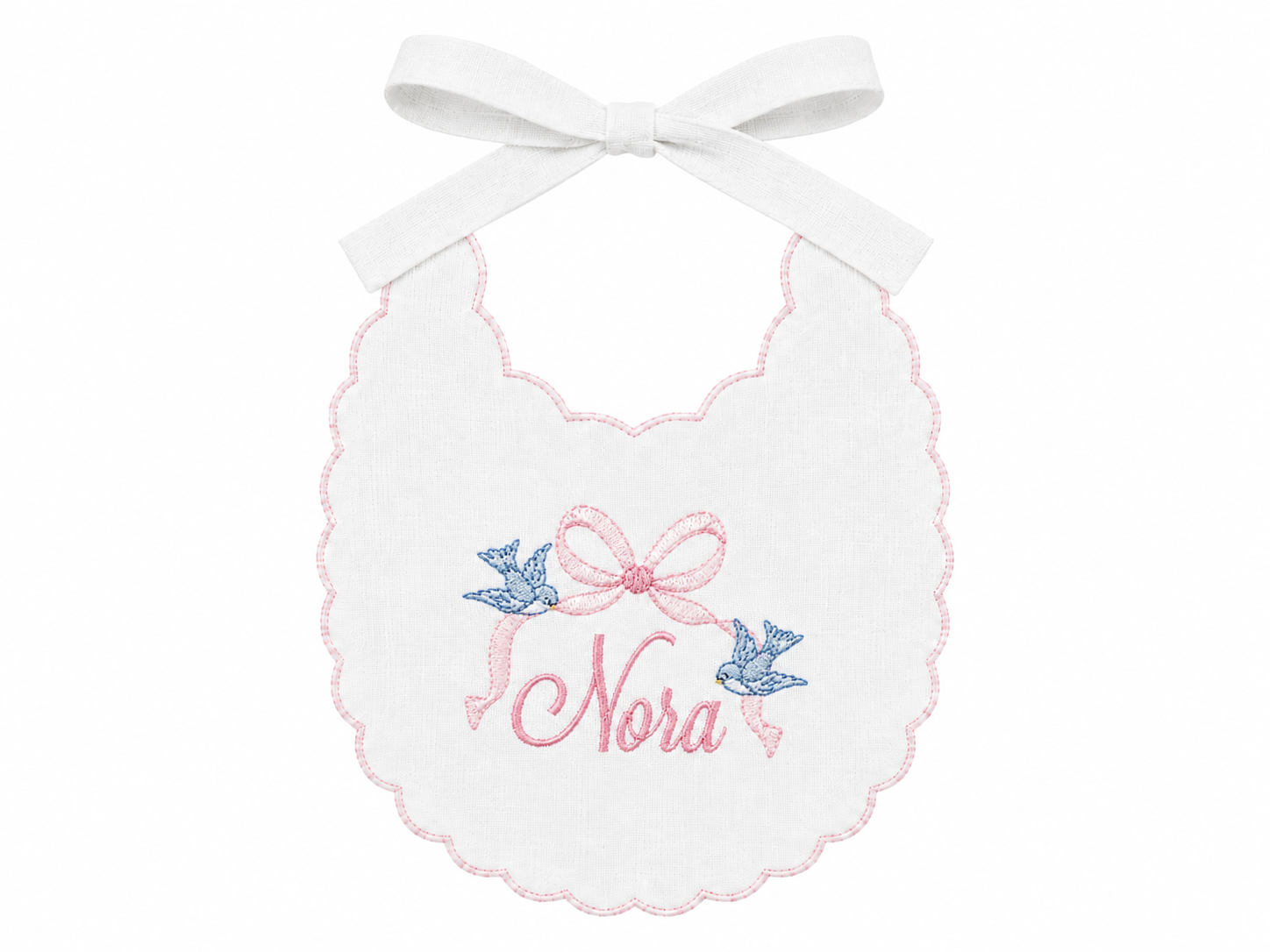 Cinderella Bow personalized linen first birthday bib with embroidered name and storybook bow details