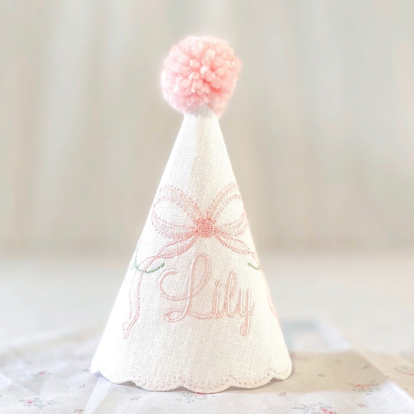 Rosebud First Birthday Hat and High Chair Banner Set – Linen Keepsake Party Decor