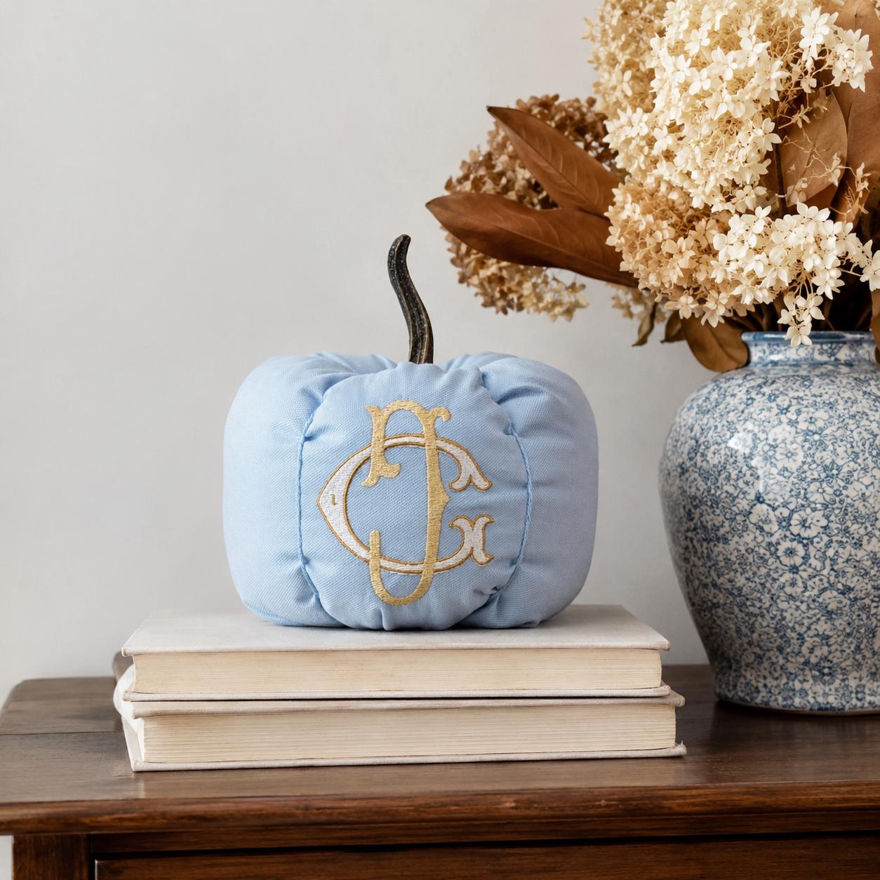Blue Garden District monogram pumpkin styled indoors for elegant fall decor