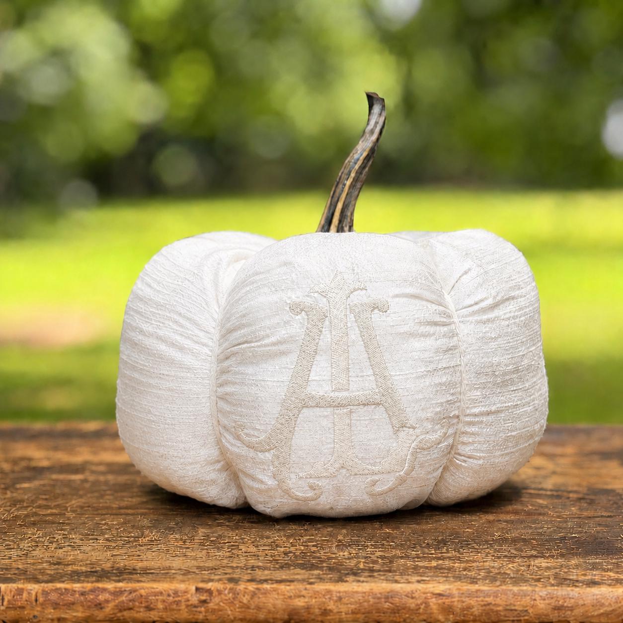 Monroe ivory silk pumpkin with a tone-on-tone layered initial monogram