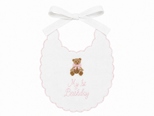 Pink Teddy Bear linen first birthday bib with embroidered teddy bear and soft pink details