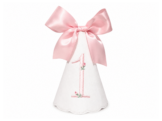 Rosette linen first birthday party hat with pink rosette embroidery and bow topper